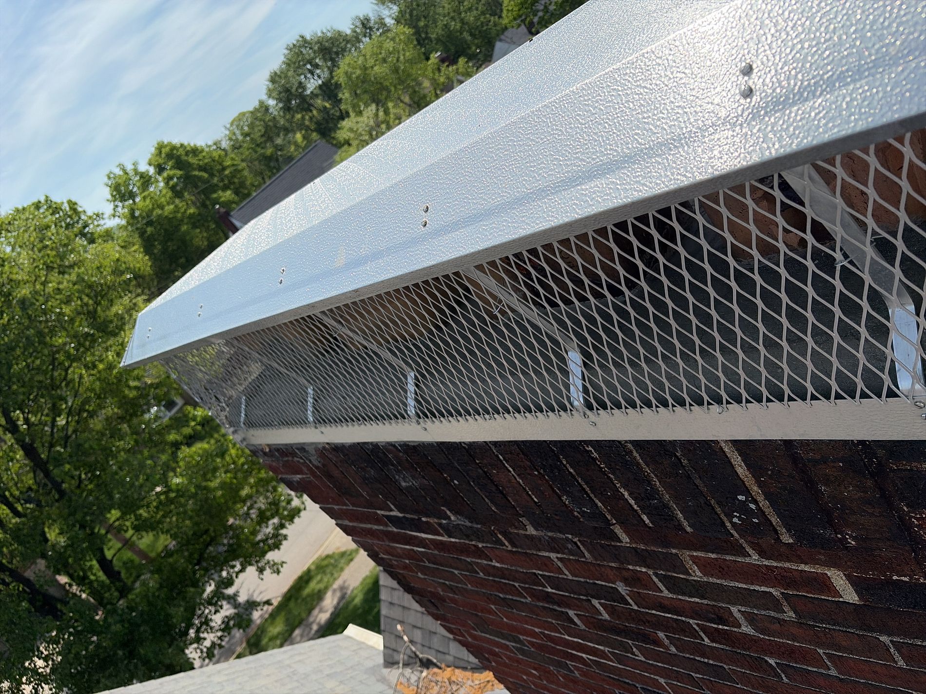 Parker Roofing crew completing chimney repair work on a Cincinnati home
